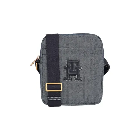 TOMMY HILFIGER TORBA LISTONOSZKA TH MONOGRAM MINI REPORTER GRANATOWA AM0AM11283 DW6