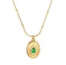 Naszyjnik amulet złoty łezka z kryształkiem szmaragdowym