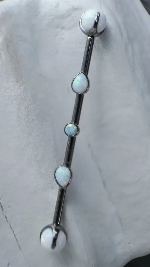 Tytanowa sztanga z nakrętkami 'opal mix'