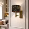 Designerski kinkiet ścienny NIKKI MARBLE w starym złocie