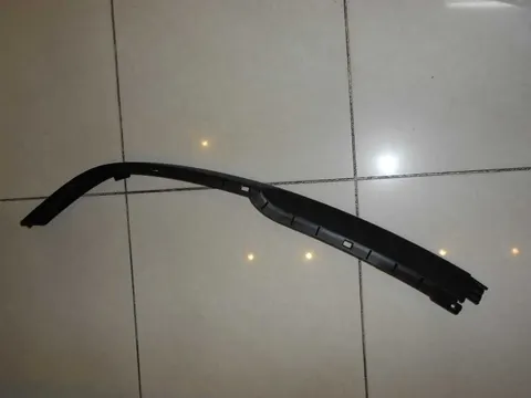 Spoiler prawy dolny zderzaka przedniego Astra H