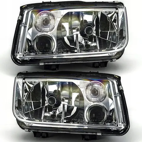 REFLEKTORY LAMPY PRZEDNIE VW BORA H4 H3 98- LEWA+PRAWA ZESTAW