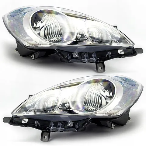 REFLEKTORY LAMPY PRZEDNIE NISSAN NOTE - LEWA+PRAWA ZESTAW